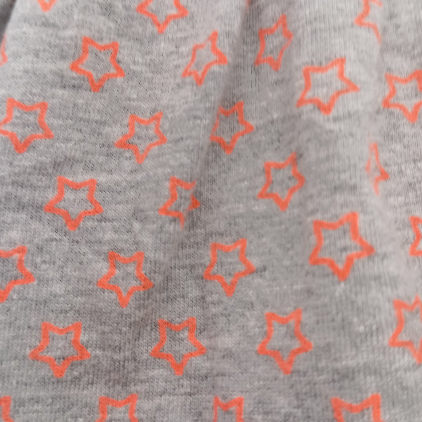 Jupe Bébé Fille Grise Pommette avec Étoile Orange – 6 à 12 Mois – 2,50 €